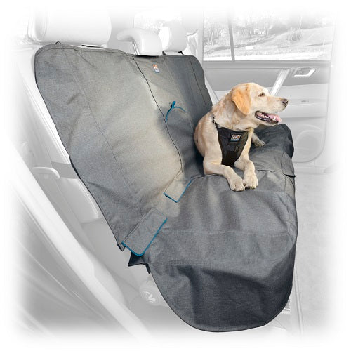 Dog laying on back seat of car that is protected with heather gray bench seat cover