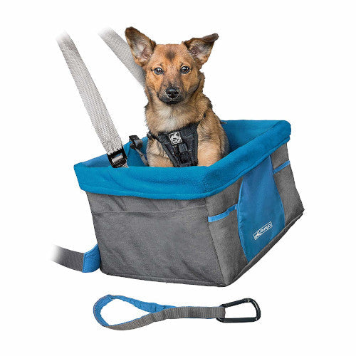 Dog sitting in waterproof, stain-resistant booster seat